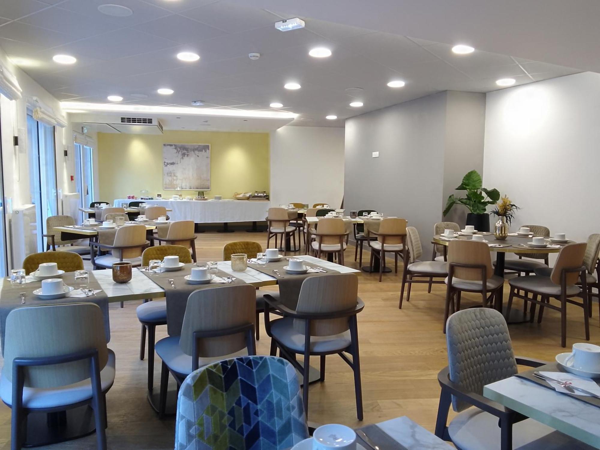 Aparthotel Domitys L'Ellipse Parigi Esterno foto