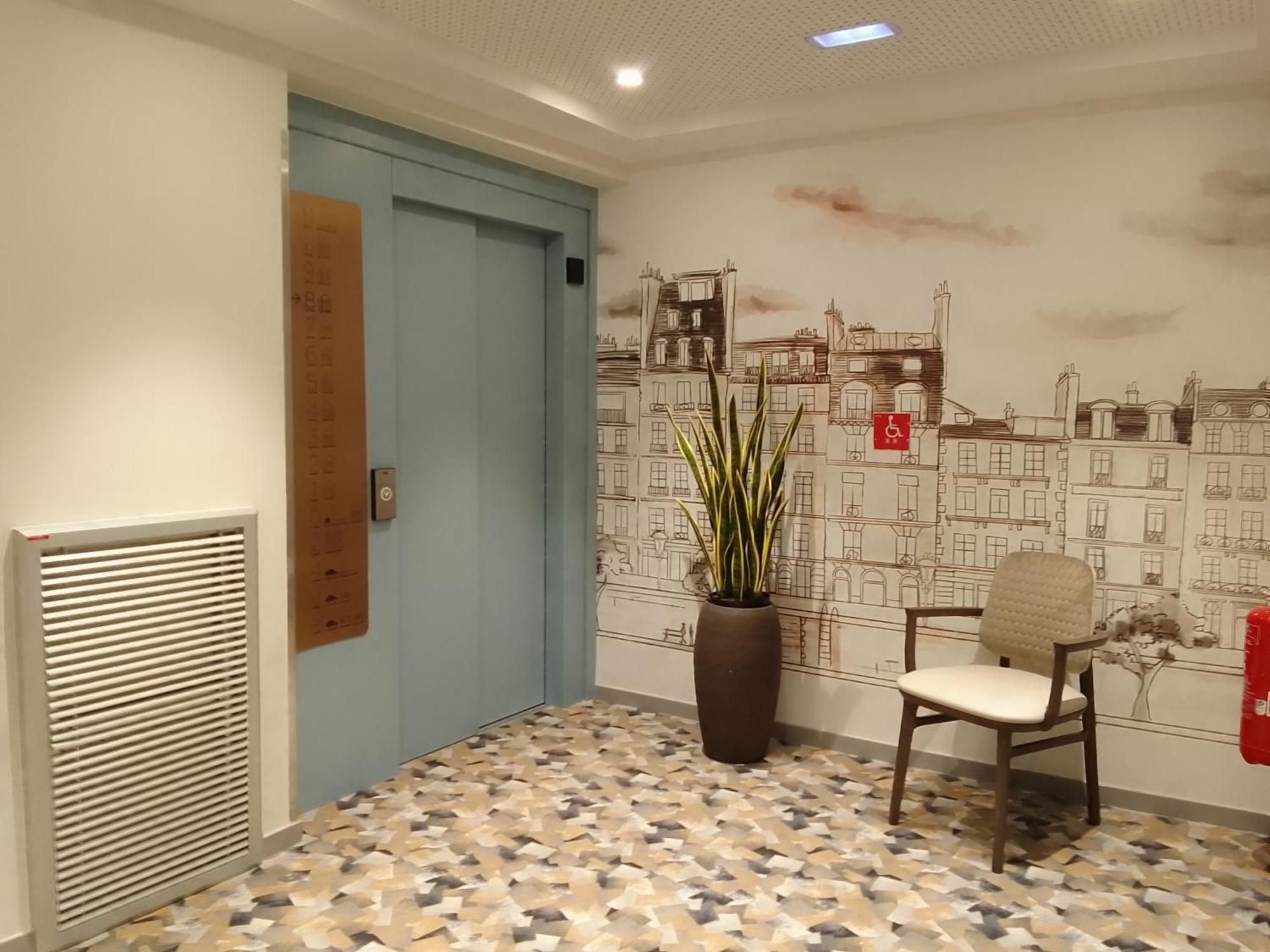 Aparthotel Domitys L'Ellipse Parigi Esterno foto