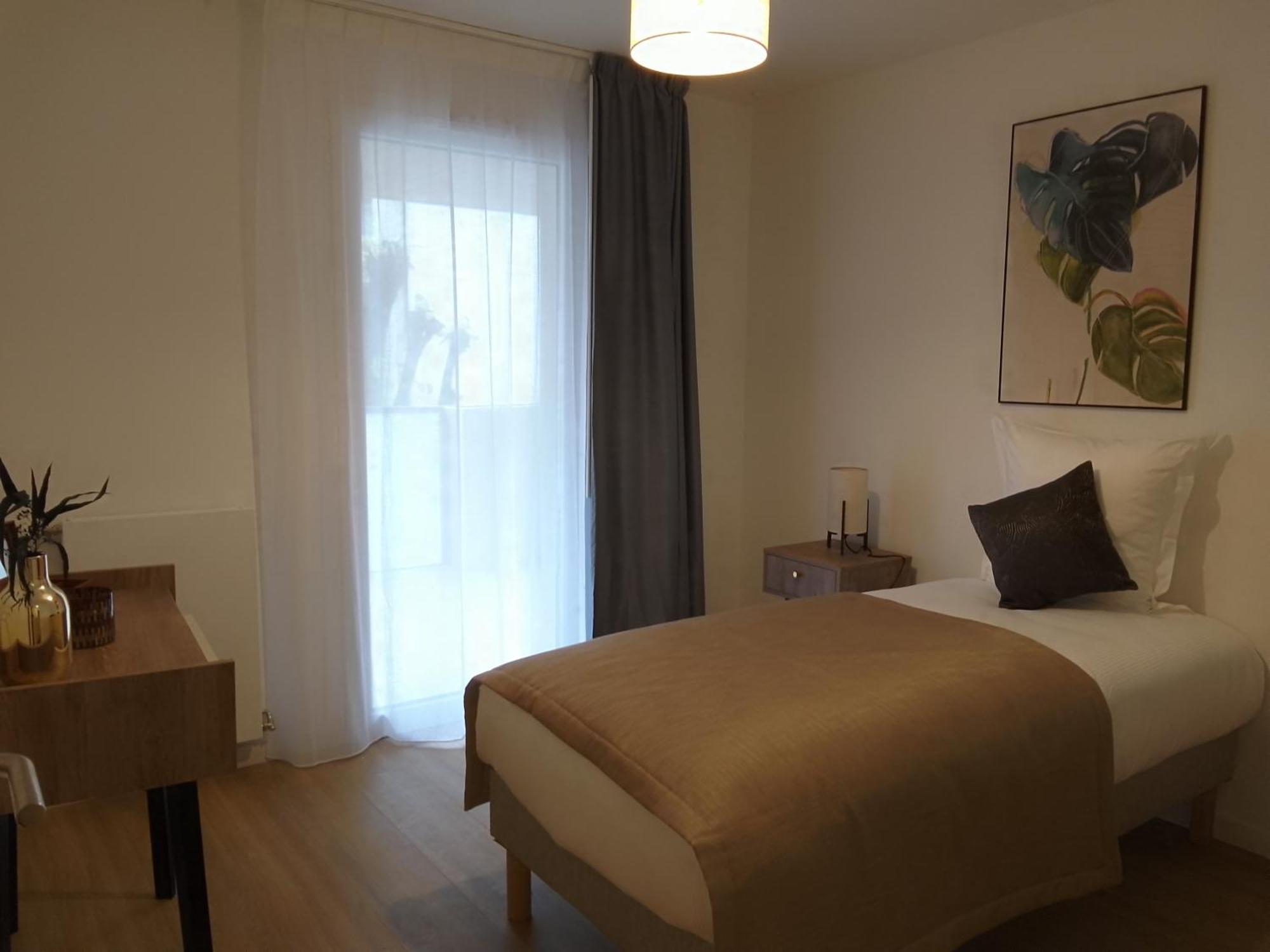 Aparthotel Domitys L'Ellipse Parigi Esterno foto